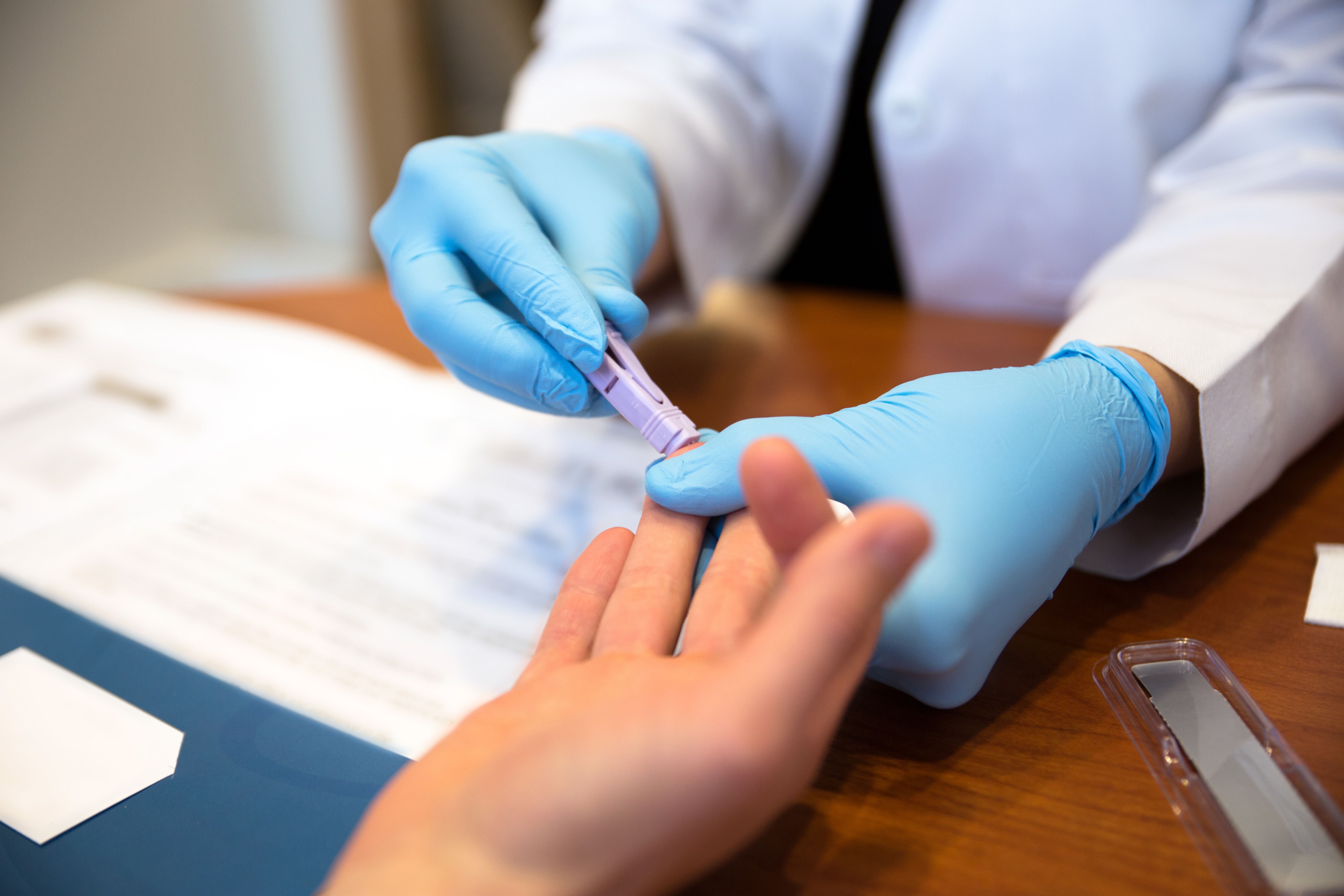 Patient getting a blood test from a doctor