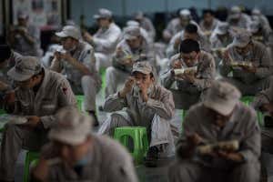 A factory worker in Wuhan eating lunch